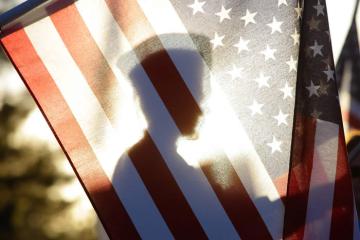 American flag and soldier